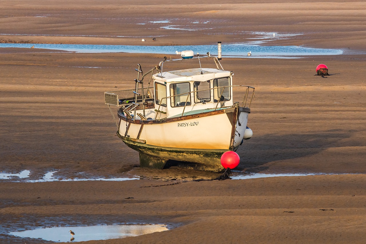 Typical Tidal Boat Stranded On Norfolk Beach